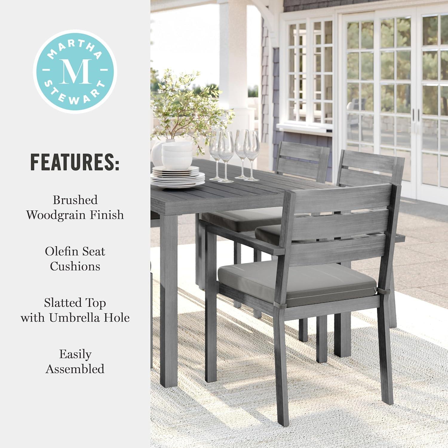 imageMartha Stewart Bedford 7 Piece Aluminum Patio Set with 62quot Table and 6 Stackable Chairs with Gray Brushed Woodgrain Finish Gray AllWeather Seat CushionsGrey