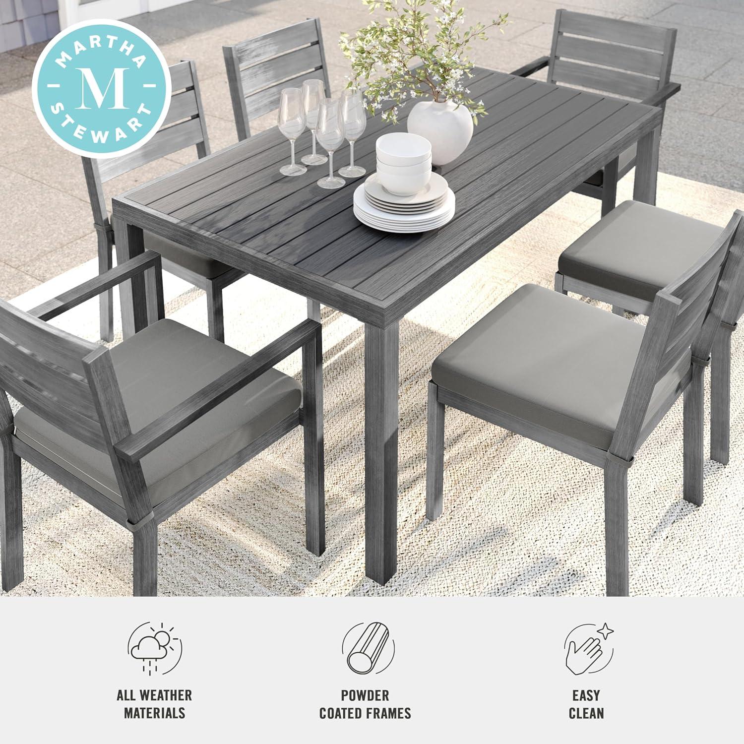 imageMartha Stewart Bedford 7 Piece Aluminum Patio Set with 62quot Table and 6 Stackable Chairs with Gray Brushed Woodgrain Finish Gray AllWeather Seat CushionsGrey