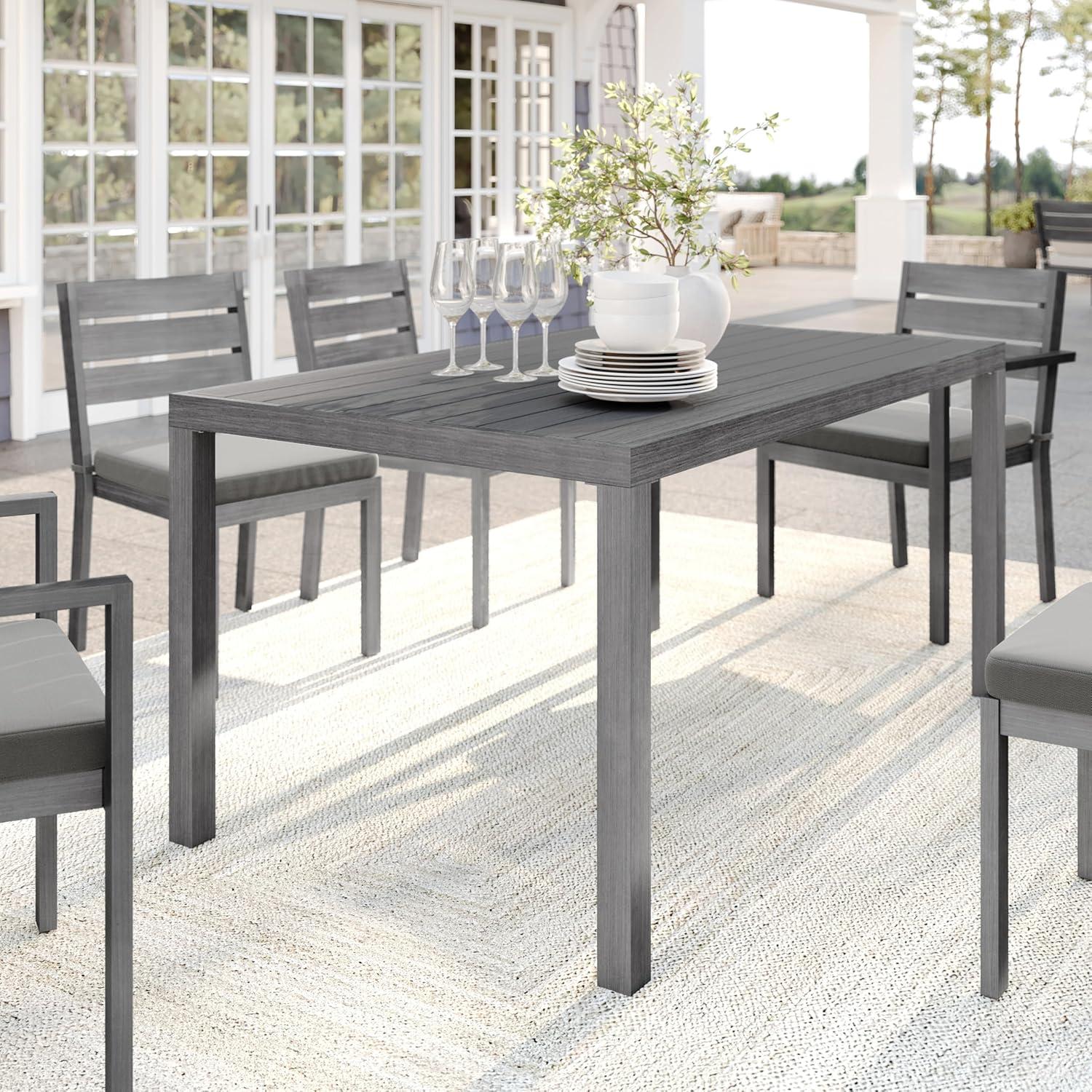 imageMartha Stewart Bedford 71quot IndoorOutdoor Aluminum Patio Table with Umbrella Hole and Brushed Woodgrain Finish in BrownGrey