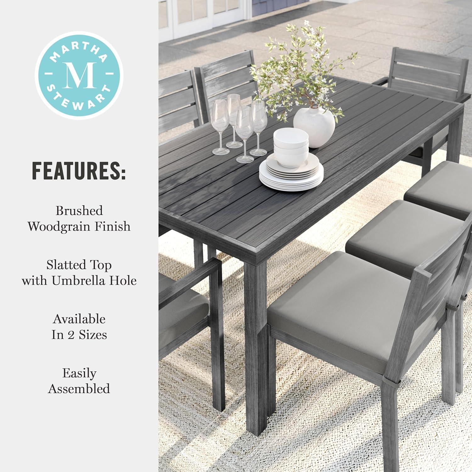 imageMartha Stewart Bedford 71quot IndoorOutdoor Aluminum Patio Table with Umbrella Hole and Brushed Woodgrain Finish in BrownGrey