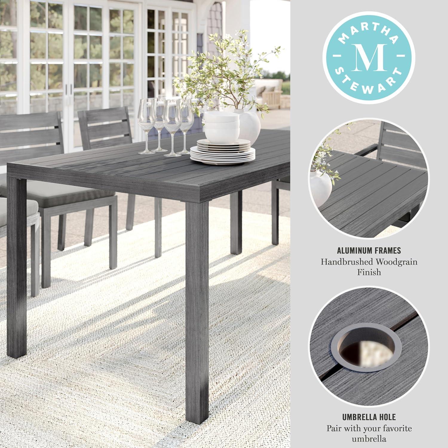 imageMartha Stewart Bedford 71quot IndoorOutdoor Aluminum Patio Table with Umbrella Hole and Brushed Woodgrain Finish in BrownGrey