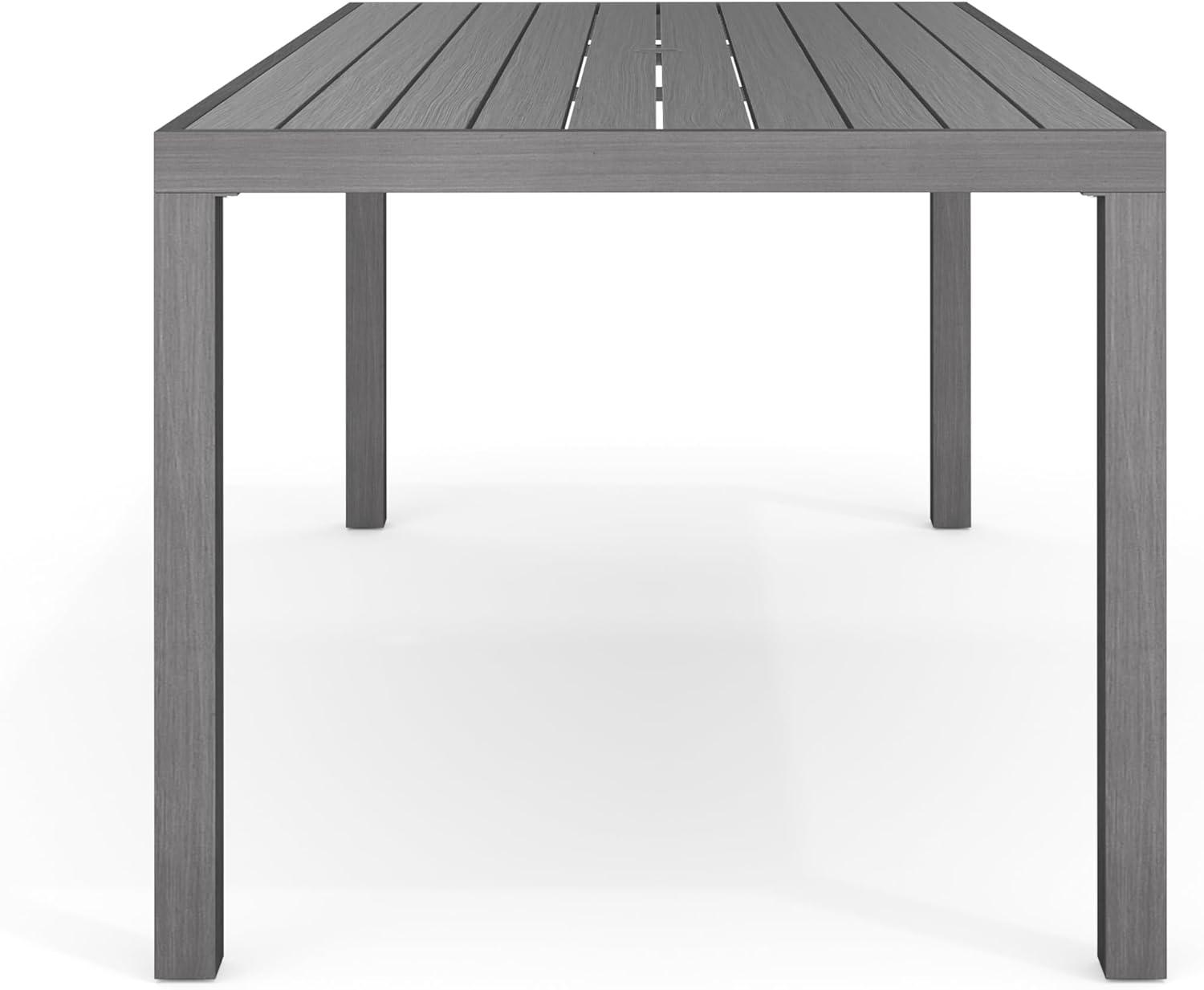 imageMartha Stewart Bedford 71quot IndoorOutdoor Aluminum Patio Table with Umbrella Hole and Brushed Woodgrain Finish in BrownGrey