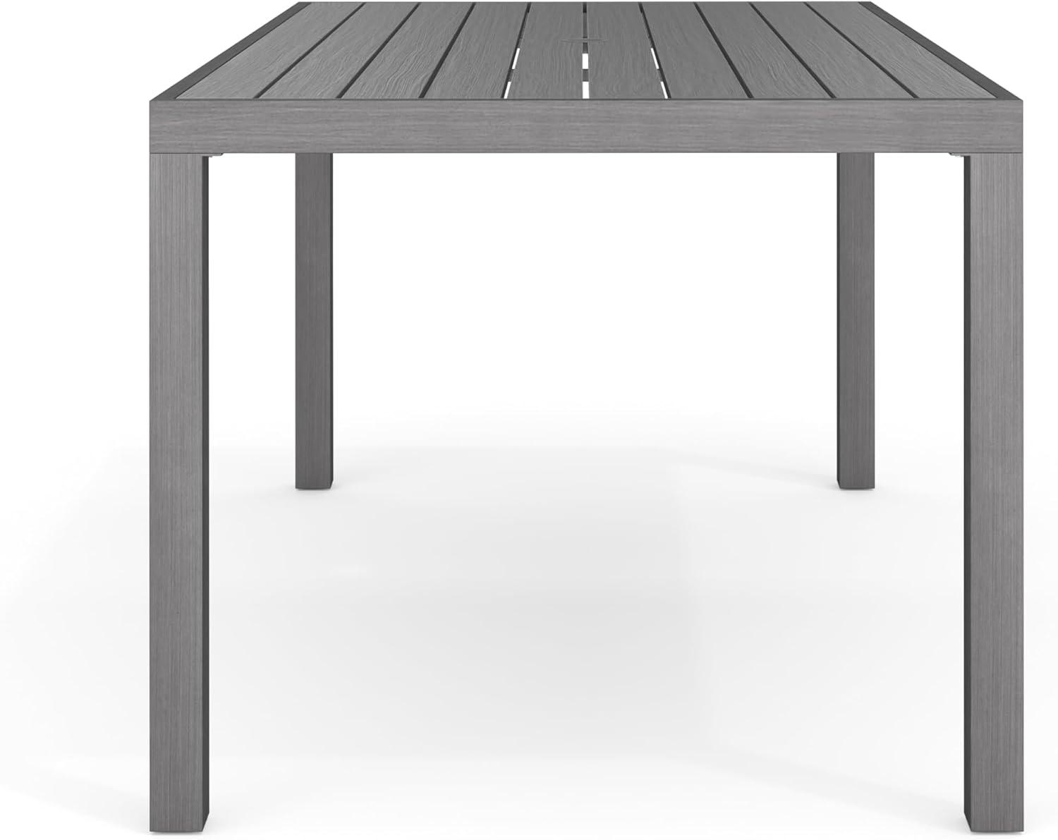 imageMartha Stewart Bedford 71quot IndoorOutdoor Aluminum Patio Table with Umbrella Hole and Brushed Woodgrain Finish in BrownGrey