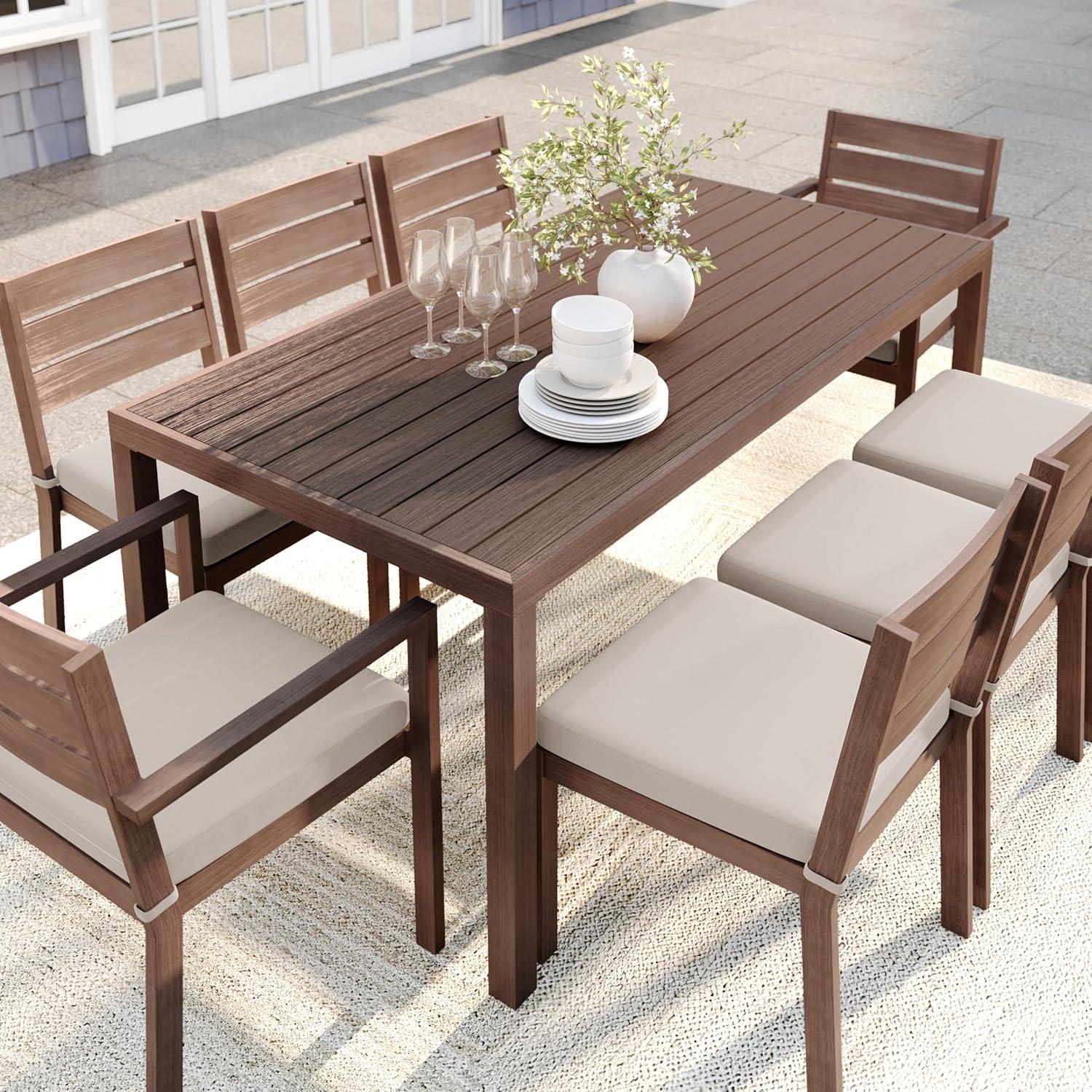 imageMartha Stewart Bedford 9 Piece Patio Set with 71quot Table and 8 Stackable Chairs with Brown Brushed Woodgrain Aluminum Finish Cream AllWeather Seat Cushions
