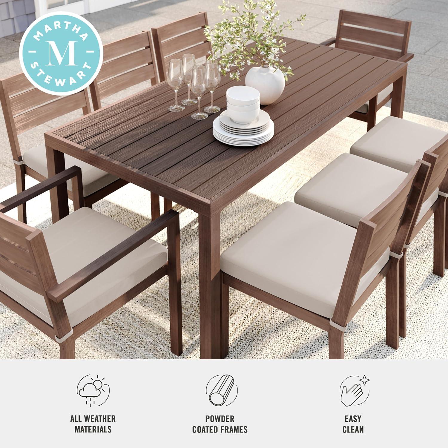 imageMartha Stewart Bedford 9 Piece Patio Set with 71quot Table and 8 Stackable Chairs with Brown Brushed Woodgrain Aluminum Finish Cream AllWeather Seat Cushions