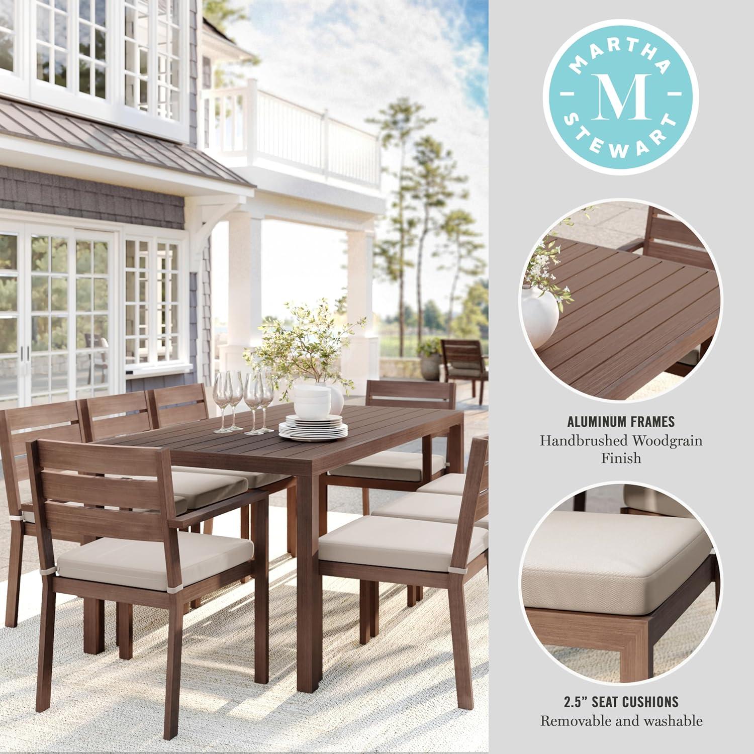 imageMartha Stewart Bedford 9 Piece Patio Set with 71quot Table and 8 Stackable Chairs with Brown Brushed Woodgrain Aluminum Finish Cream AllWeather Seat Cushions