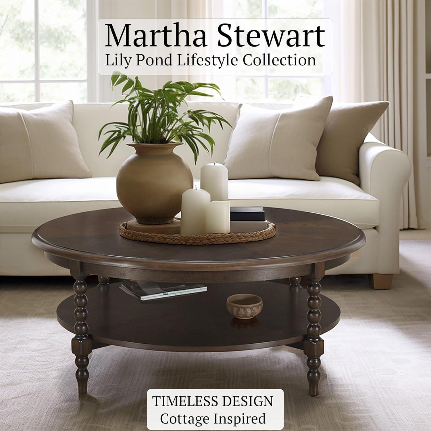imageMartha Stewart Philippe Round Coffee Table for Living Room Lily Pond Collection Coastal Coffee Table with Shelving for Storage Cottage Inspired Living Room Table 42quot Wide Brown