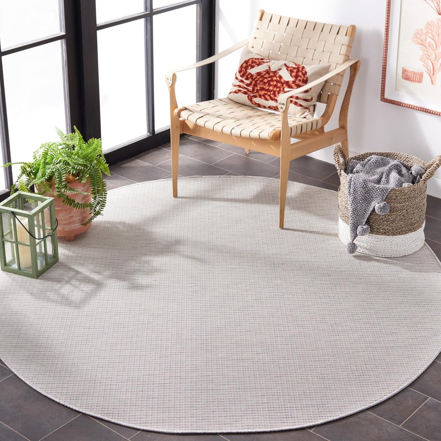 imageMartha Stewart x SAFAVIEH Outdoor Area Rug Collection 65quot Round Navy Weather Resistant ampamp Washable Ideal for Patio Backyard Mudroom Deck Dining Space MSR4490NIvory